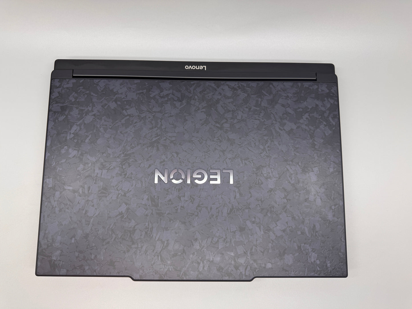 Black laptop with 'Legion' branding on a white background
